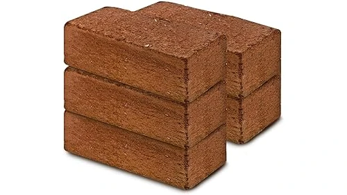 The image shows a close-up of loose coco coir bricks, ideal for hydroponic gardening.