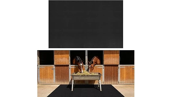 The image shows a horse stall floor made of durable interlocking mats, a top choice for horse stall flooring.