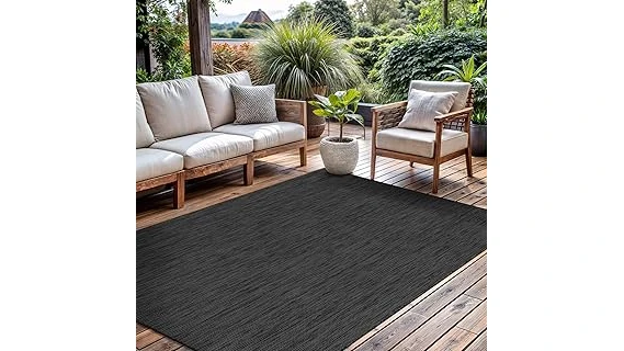 The image shows a deck with a durable, attractive outdoor carpet, perfect for entertaining.