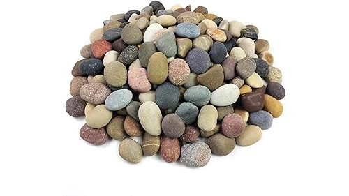The image shows a variety of natural river rocks, perfect for landscaping projects.