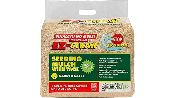 The image shows a neatly spread layer of grass seed starter covering for a healthy lawn.