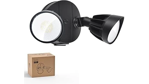 The image shows a selection of bright outdoor spotlights illuminating a house's exterior at night.