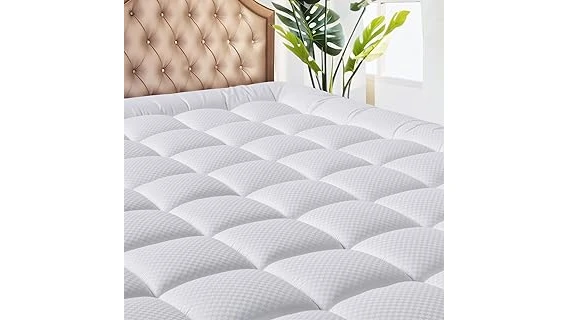 The image shows a plush mattress topper placed on a bed, suggesting comfort and a better sleep experience.
