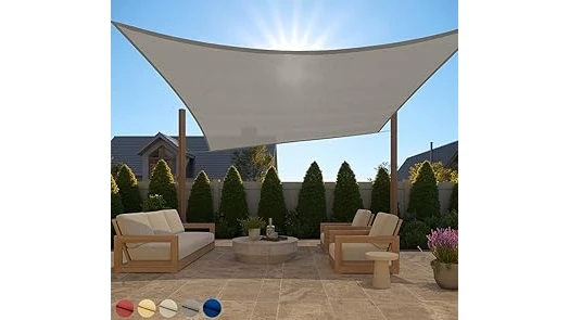 This image shows a stylish, durable shade sail installation protecting a patio from strong winds.