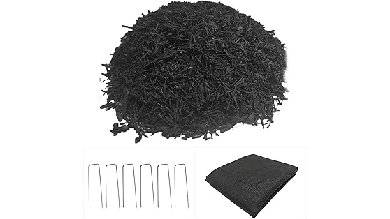 The image shows a vibrant landscape featuring piles of popular black mulch for landscaping.