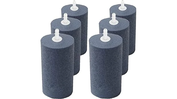The image shows several different air stones used in hydroponic systems for growing plants.
