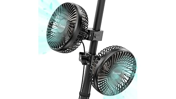 The image shows a small, sleek fan positioned inside a miniature greenhouse environment.