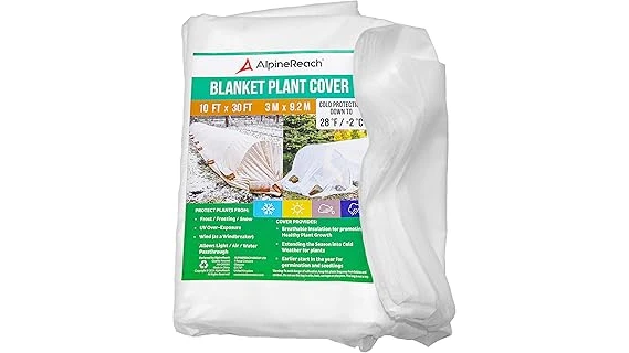 The image shows a garden bed covered in wood chip mulch for winter protection.