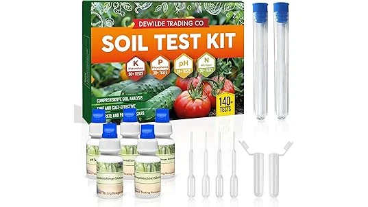 The image shows a close-up of a soil test kit, displaying colorful results for vegetable garden soil health.