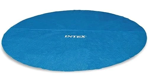 The image shows a shimmering blue above ground pool covered by a solar blanket.