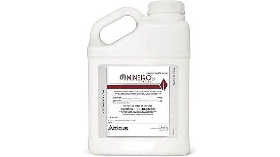 The image shows a lush green lawn treated with top-rated insect control products for a pest-free yard.