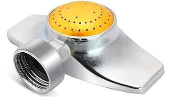 The image shows several compact sprinklers arranged for watering a small garden area.