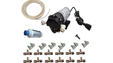 The image shows a backyard patio setup with a high-pressure misting system cooling a seating area.