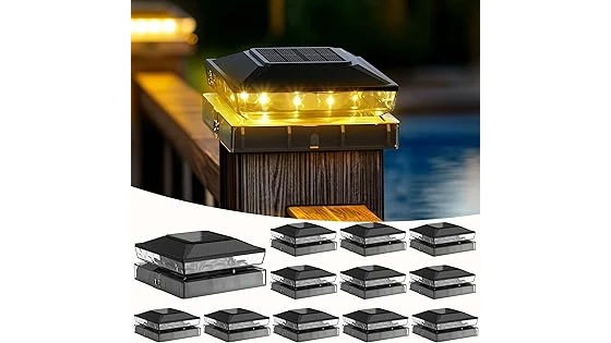 The image shows multiple fence post solar lights illuminating a dark pathway in a garden setting.