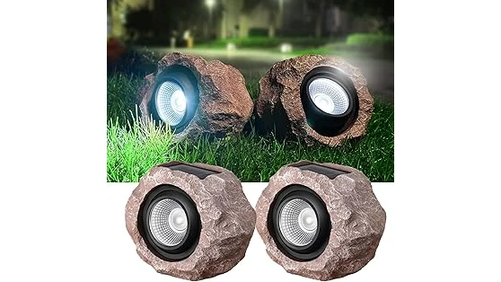 The image shows realistic outdoor solar rock lights illuminating a garden path at night.