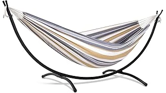 The image shows a comfortable, sturdy double hammock with a stand, perfect for outdoor relaxation.